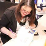 Sara-firmando